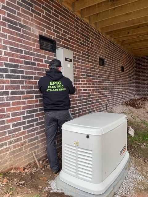 Shannon installing a backup generator at a residential home